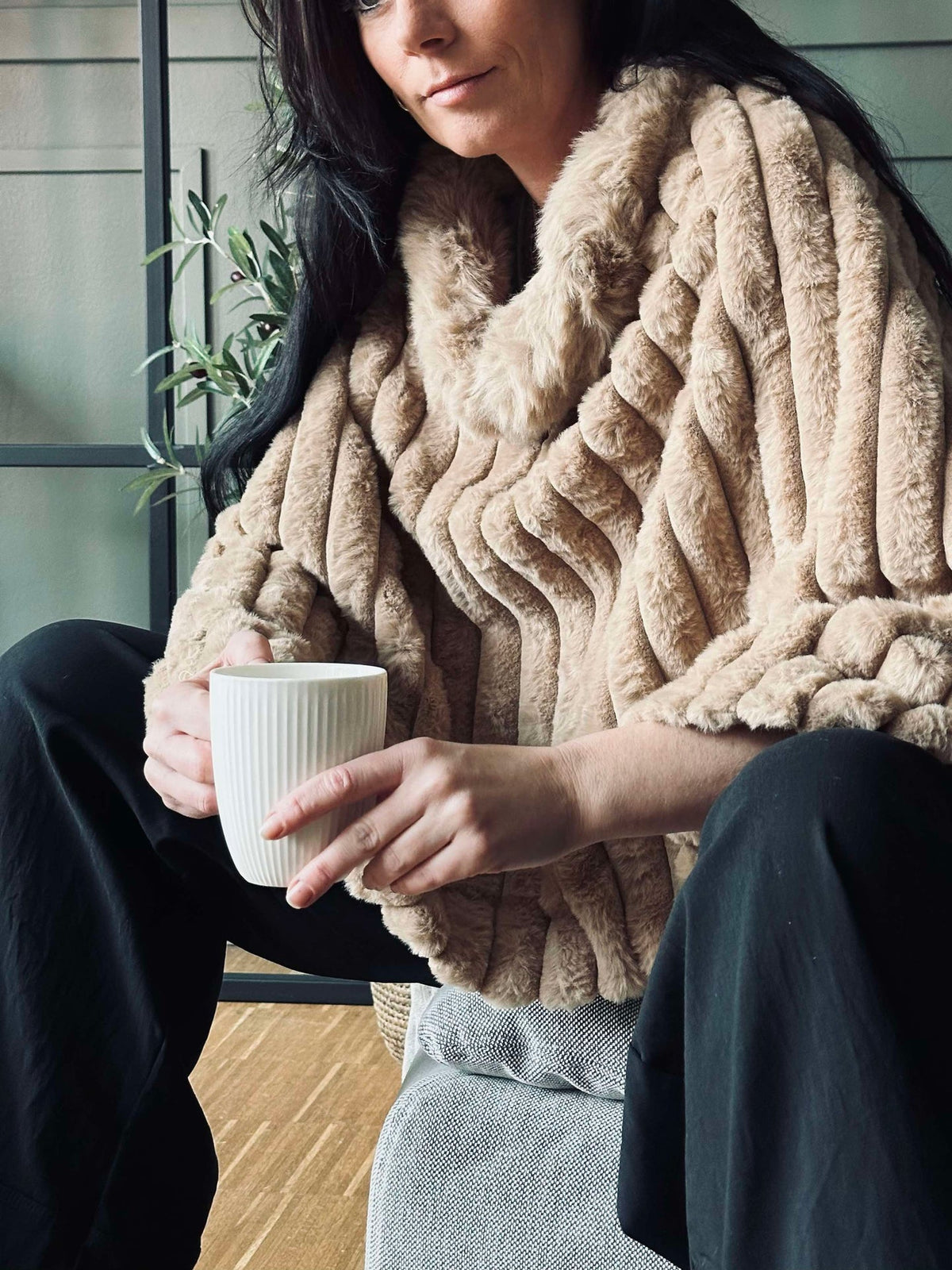 Poncho en fausse fourrure