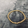 Bracelet plaqué or 14 carats composé de perles délicates