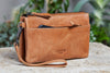 Pochette ASTA avec longue bandoulière et dragonne, Cognac
