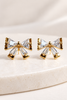 Boucles d’oreilles ARIELLE avec nœud et zircones