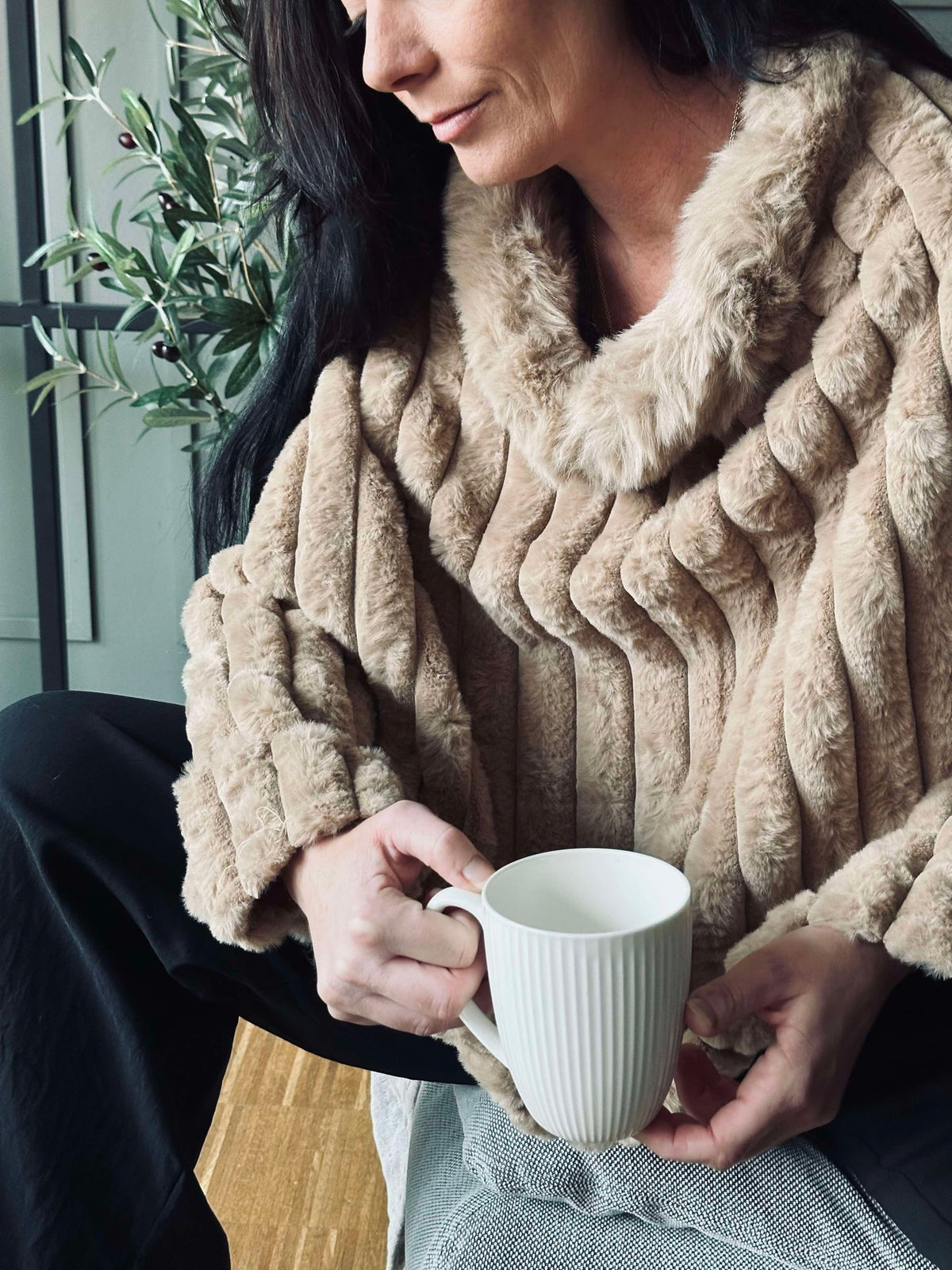Poncho en fausse fourrure