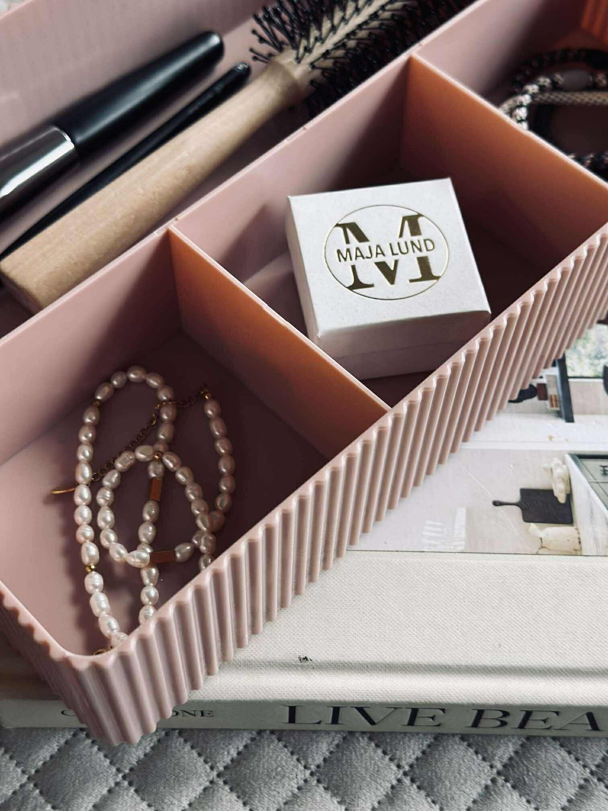 Organisateur de maquillage compartimenté - Rose