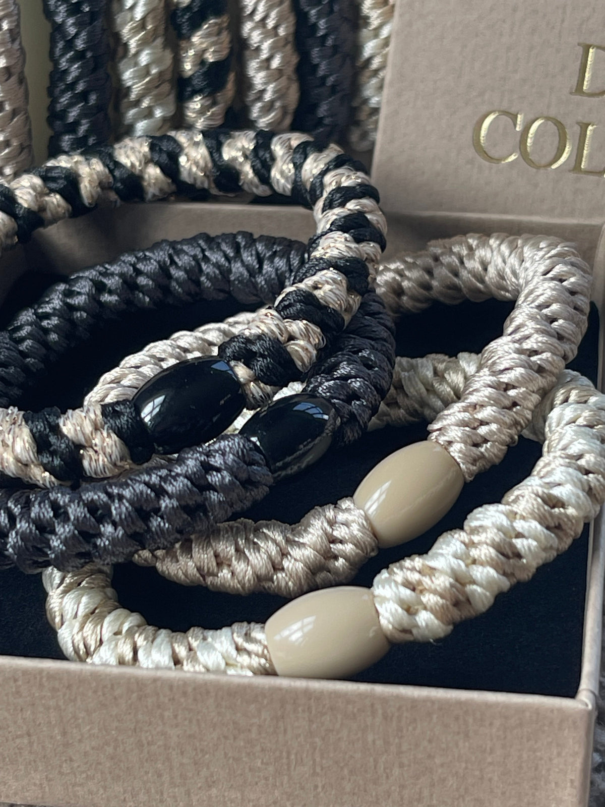 Élastiques à cheveux Supreme Black / Nature - lot de 4