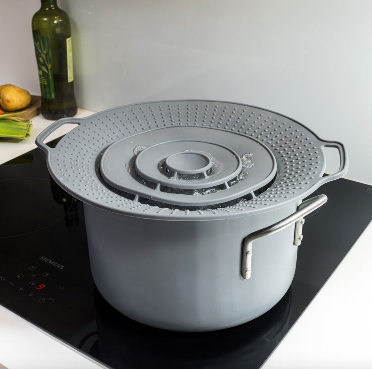 Couvercle pour casserole avec protection anti-débordement