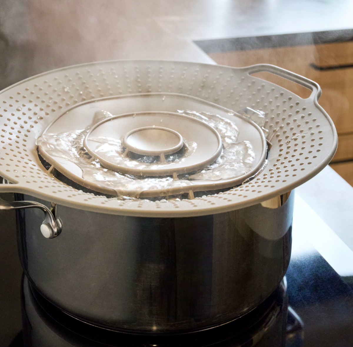 Couvercle pour casserole avec protection anti-débordement