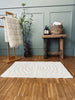 Tapis de bain à motifs de cercles blanc cassé