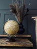 Globe sur socle en bois - Doré