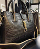 Sac à main Mary en cuir noir avec boucles dorées