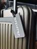 Étiquette de valise Grise