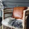 Coussin en cuir cognac 50x50cm