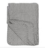 Plaid matelassé rayures blanches et noires