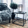 Table d’appoint en bois et métal noir