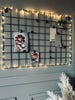 Tableau en métal noir – avec guirlande lumineuse et pinces