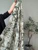 Écharpe verte à motifs dorés